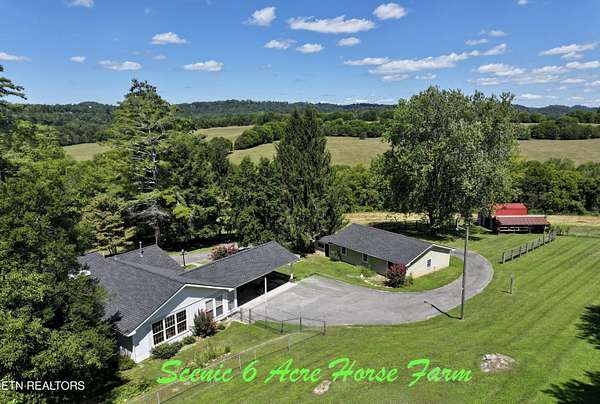 6.1 Acres of Land with Home for Sale in Madisonville, Tennessee