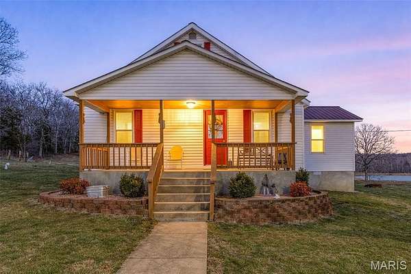 82 Acres of Agricultural Land with Home for Sale in Fredericktown, Missouri