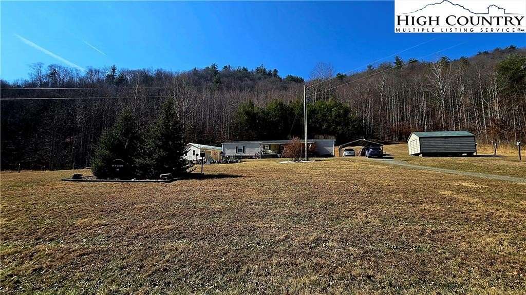 8.3 Acres of Land with Home for Sale in Millers Creek, North Carolina