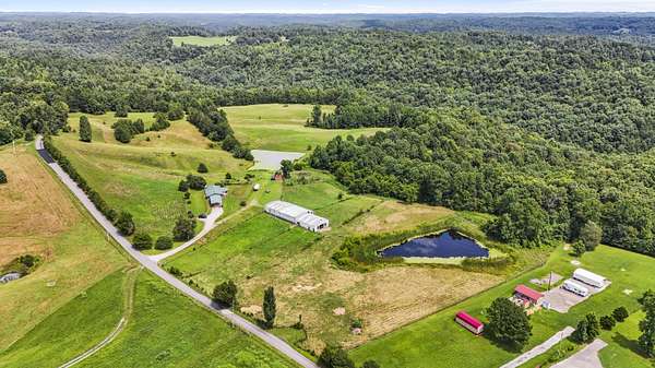 80 Acres of Agricultural Land with Home for Sale in Zoe, Kentucky