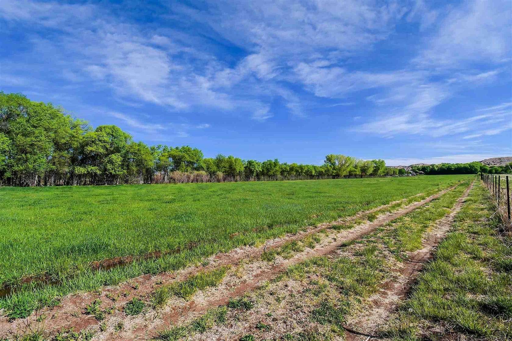 14.7 Acres of Land for Sale in Chamita, New Mexico