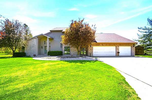 9.63 Acres of Land with Home for Sale in Garrett, Indiana