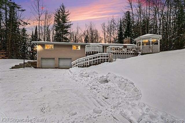 10.6 Acres of Land with Home for Sale in Fairview, Michigan