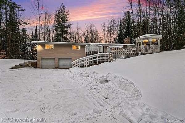 10.6 Acres of Land with Home for Sale in Comins Township, Michigan