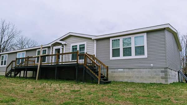 3.54 Acres of Land with Home for Sale in Chestnut Mound, Tennessee