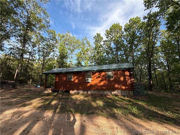 5.6 Acres of Land with Home for Sale in Climax Springs, Missouri