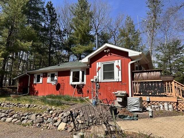0.96 Acres of Land with Home for Sale in Hayward, Wisconsin