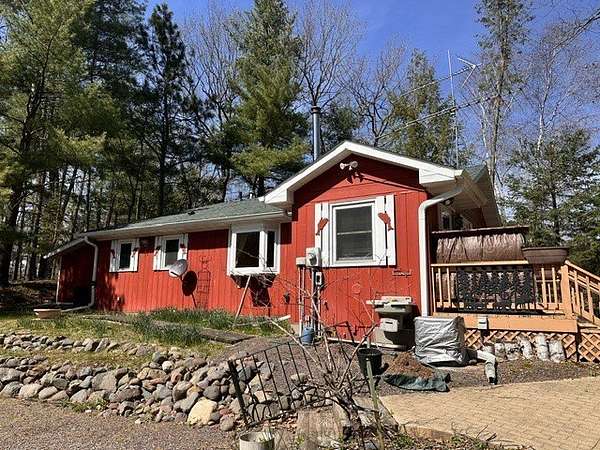 0.96 Acres of Land with Home for Sale in Hayward, Wisconsin