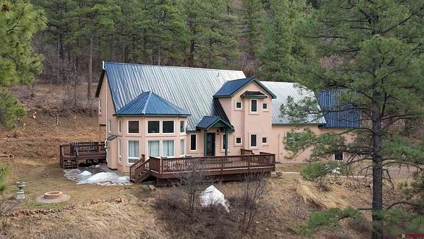8.74 Acres of Land with Home for Sale in Pagosa Springs, Colorado
