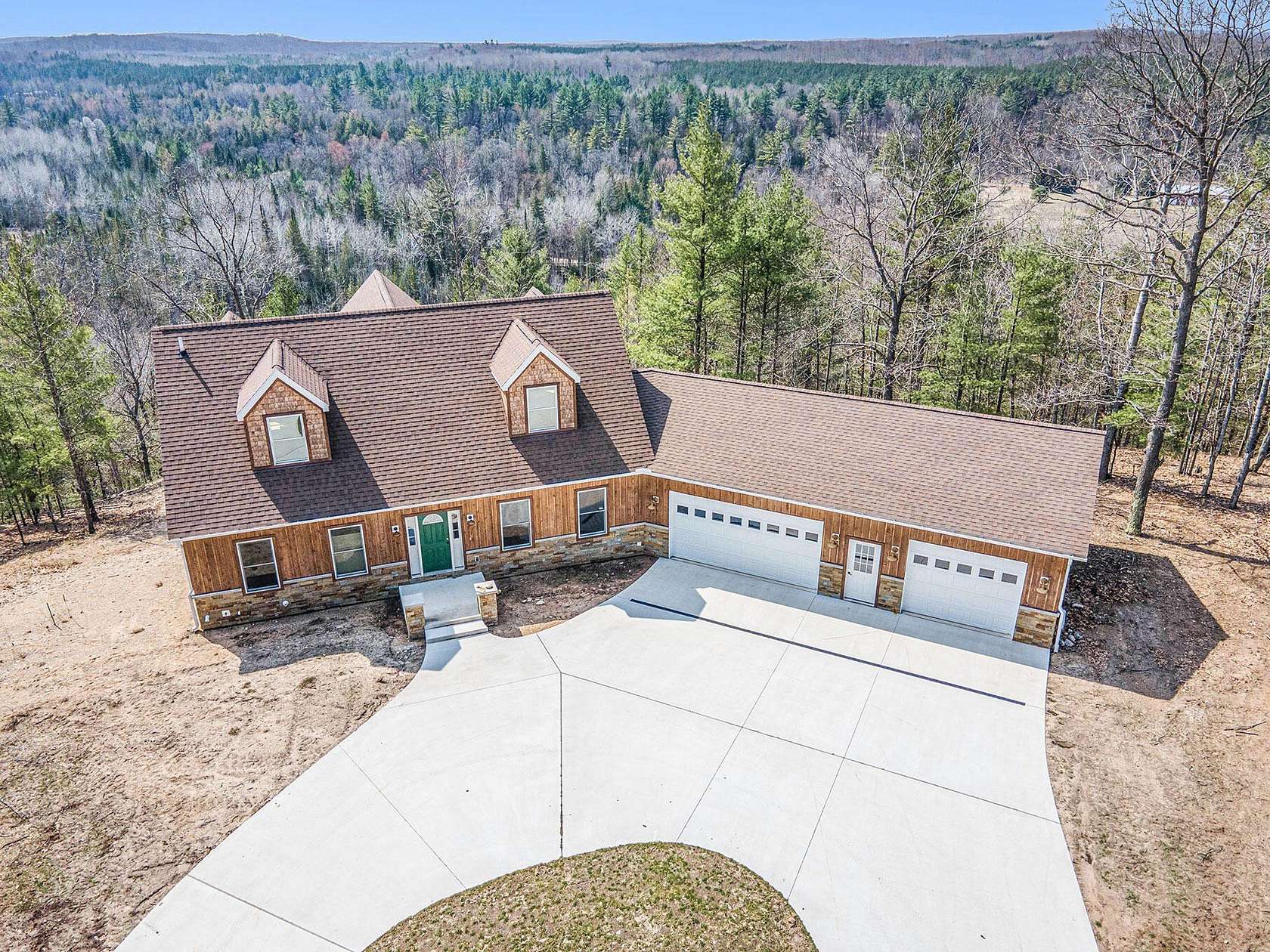 205 Acres of Recreational Land with Home for Sale in Indian River, Michigan