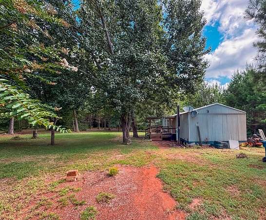 3.82 Acres of Land with Home for Sale in Elkhart, Texas