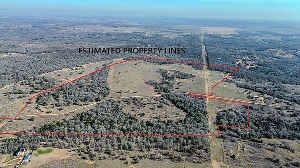 121 Acres of Land with Home for Sale in Bastrop, Texas
