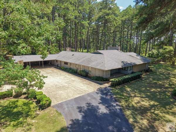 9 Acres of Land with Home for Sale in Atlanta, Texas