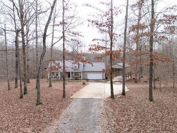 16.1 Acres of Land with Home for Sale in Nunnelly, Tennessee