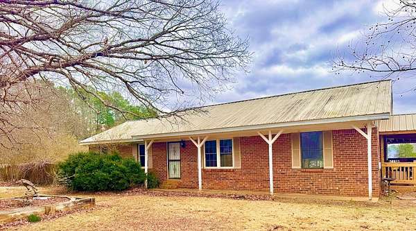 5 Acres of Land with Home for Sale in Bolivar, Tennessee