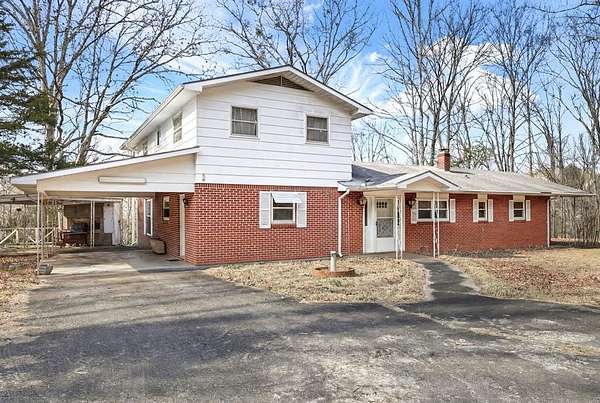 6.24 Acres of Land with Home for Sale in Franklin, North Carolina