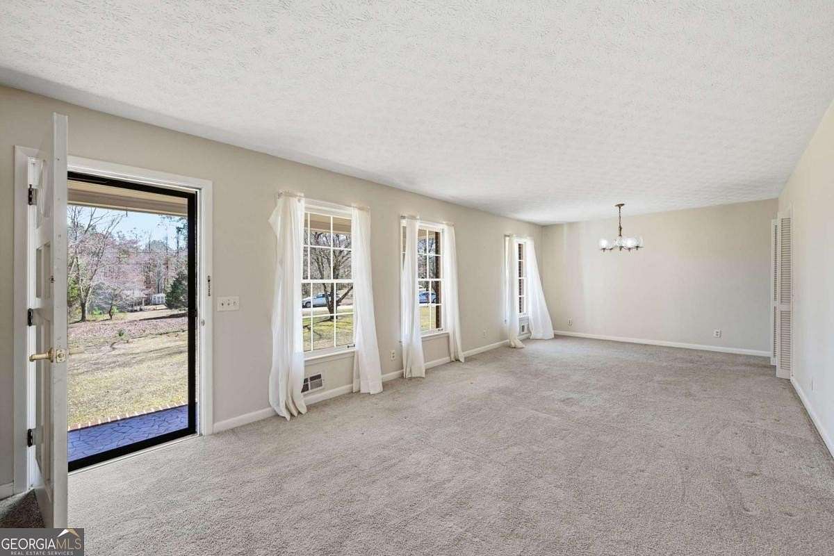 7.32 Acres of Land with Home for Sale in Cumming, Georgia