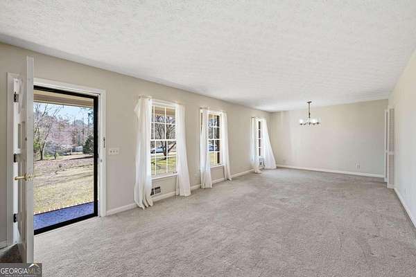 7.32 Acres of Land with Home for Sale in Cumming, Georgia