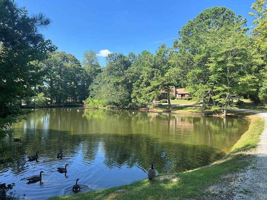5.1 Acres of Land with Home for Sale in Lithonia, Georgia