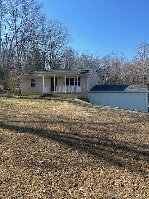 1.62 Acres of Land with Home for Sale in Camden, Tennessee