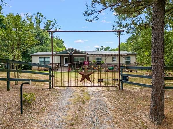 2.34 Acres of Land with Home for Sale in Marshall, Texas