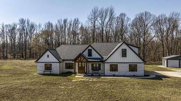 6.57 Acres of Land with Home for Sale in Drummonds, Tennessee