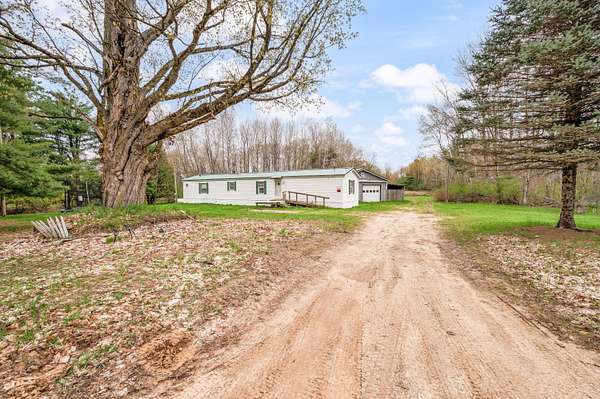 5.34 Acres of Land with Home for Sale in Sears, Michigan