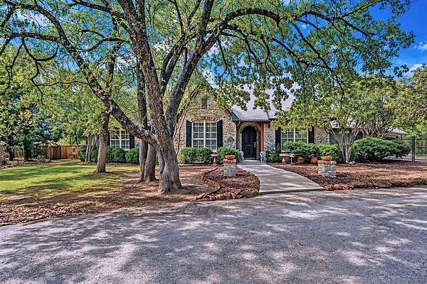 1.5 Acres of Land with Home for Sale in Cross Roads, Texas