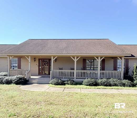 8.26 Acres of Land with Home for Sale in Castleberry, Alabama