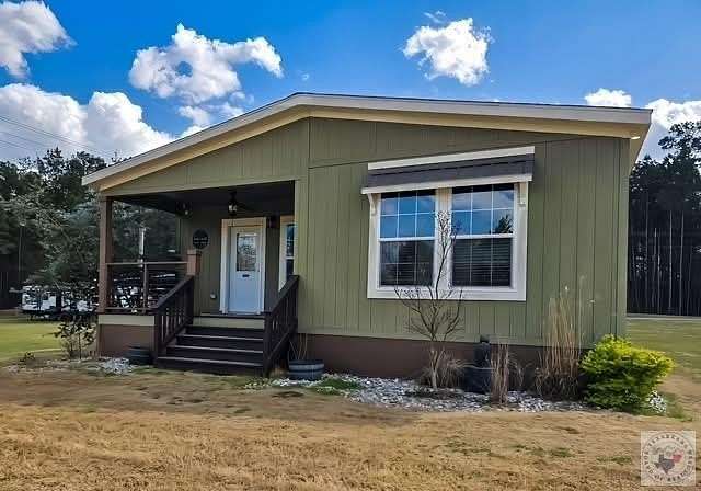 5.26 Acres of Land with Home for Sale in Atlanta, Texas