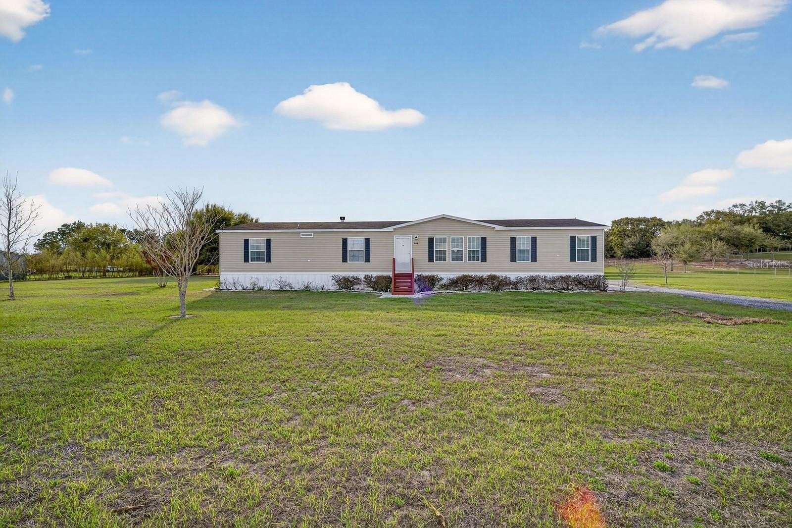 2.26 Acres of Land with Home for Sale in Howey-in-the-Hills, Florida
