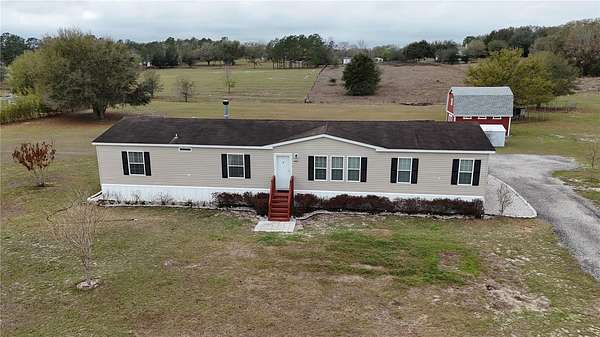 2.26 Acres of Land with Home for Sale in Howey-in-the-Hills, Florida