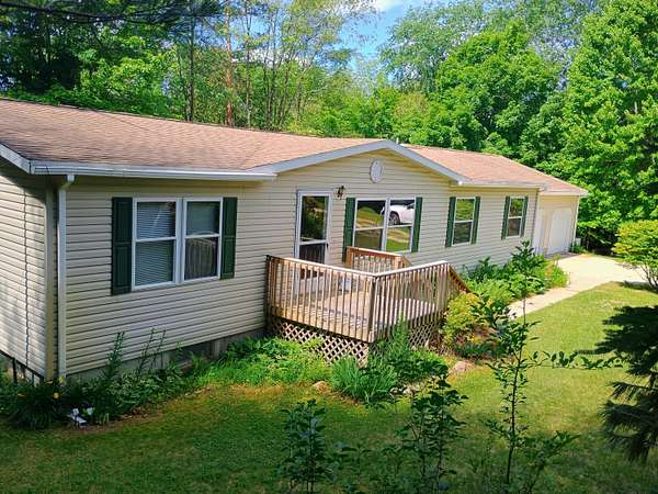 7.29 Acres of Land with Home for Sale in Blanchard, Michigan