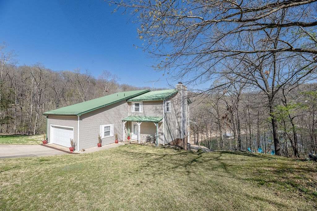 1.62 Acres of Land with Home for Sale in Garfield, Arkansas