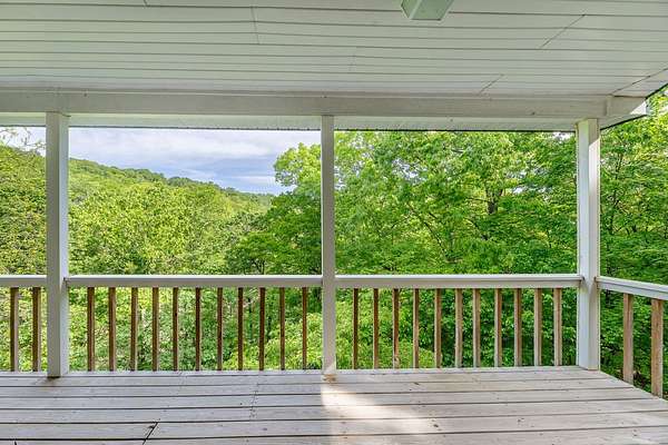 1.62 Acres of Land with Home for Sale in Garfield, Arkansas