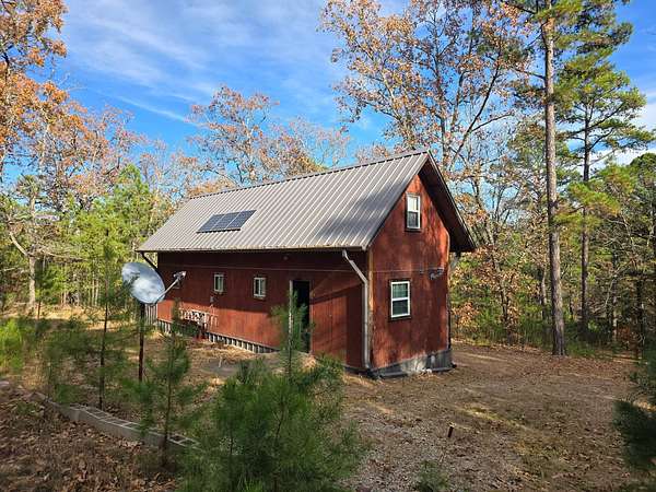 9.47 Acres of Land with Home for Sale in Moyers, Oklahoma