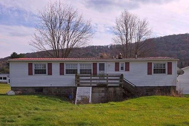 17.3 Acres of Land with Home for Sale in Port Allegany, Pennsylvania