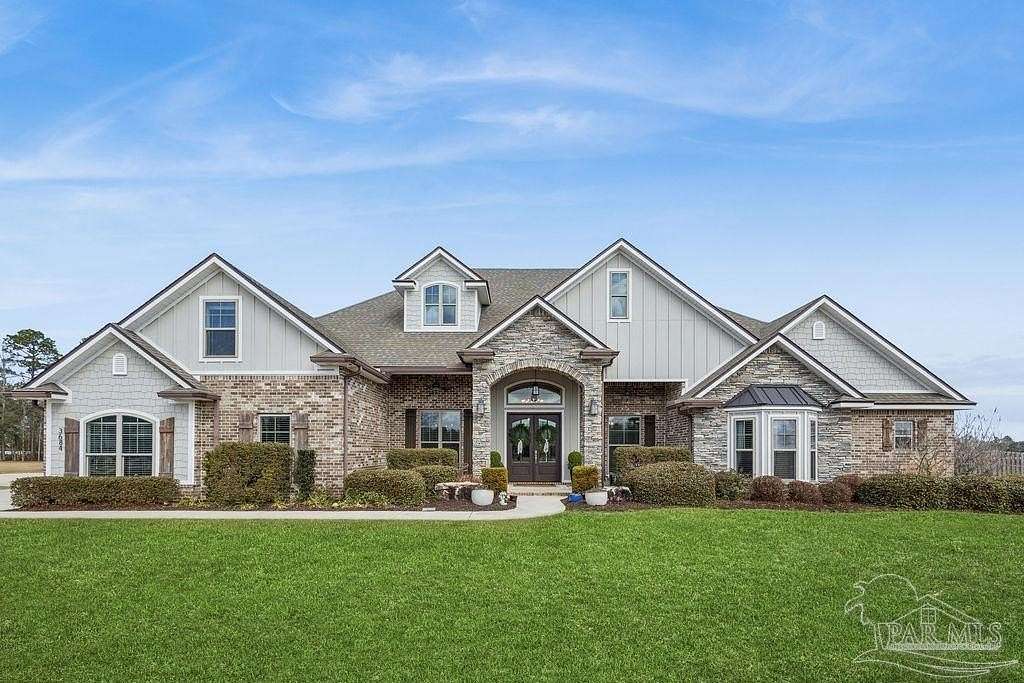 4 Acres of Land with Home for Sale in Pace, Florida