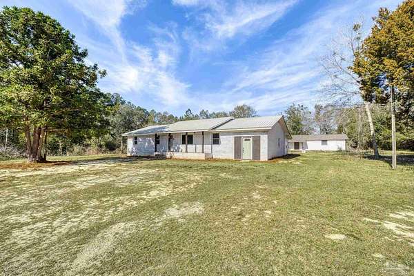 5.2 Acres of Land with Home for Sale in Milton, Florida