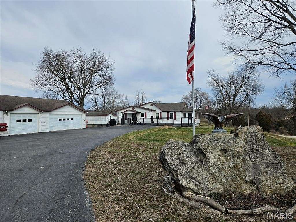 16.6 Acres of Land with Home for Sale in Richland, Missouri