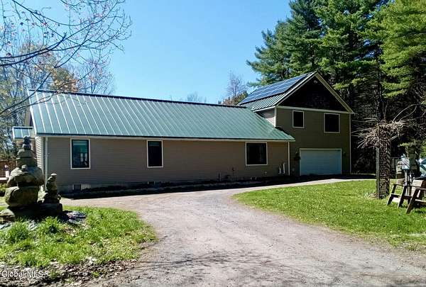 2.33 Acres of Land with Home for Sale in Lake Luzerne, New York