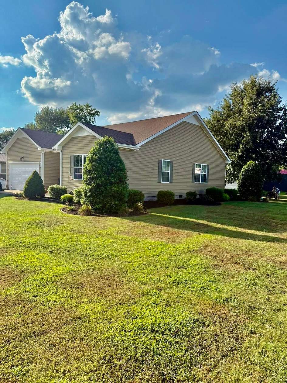 0.5 Acres of Land with Home for Sale in Elkton, Kentucky