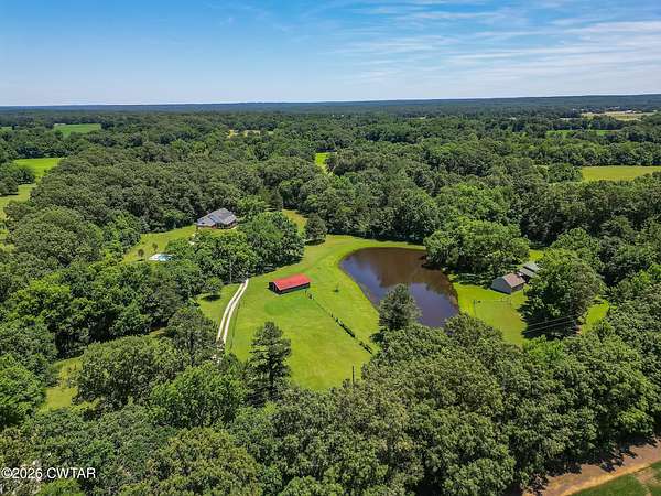 59.3 Acres of Land with Home for Sale in Medina, Tennessee