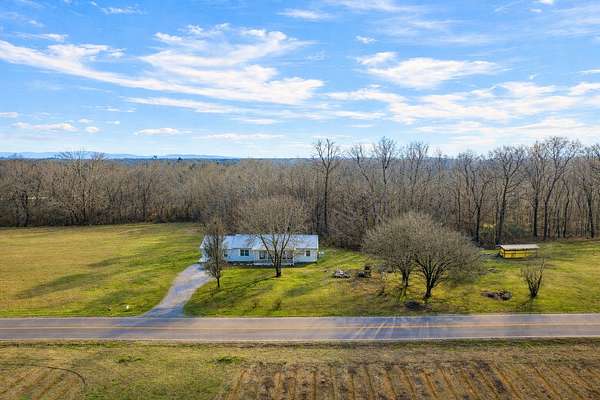 11.5 Acres of Land with Home for Sale in Belvidere, Tennessee