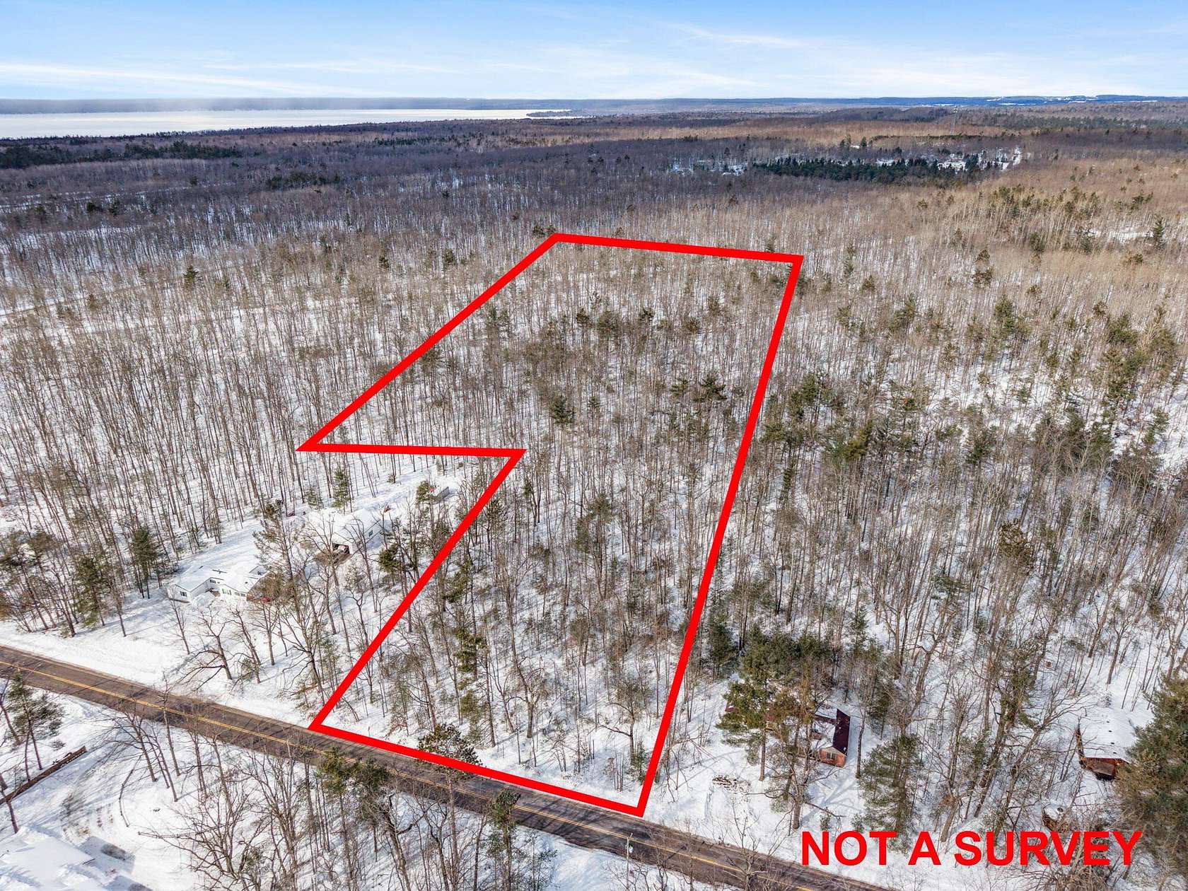 6.34 Acres of Commercial Land for Sale in Topinabee, Michigan