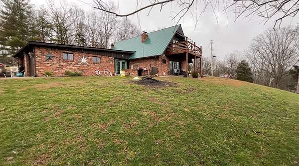 2.66 Acres of Land with Home for Sale in Louisa, Kentucky