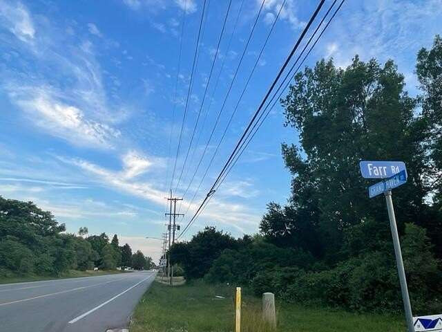 0.63 Acres of Commercial Land for Sale in Norton Shores, Michigan