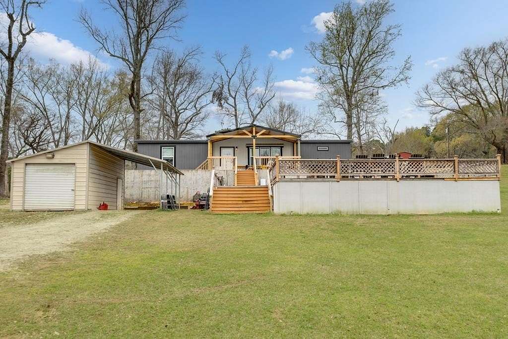 2.35 Acres of Land with Home for Sale in Palestine, Texas