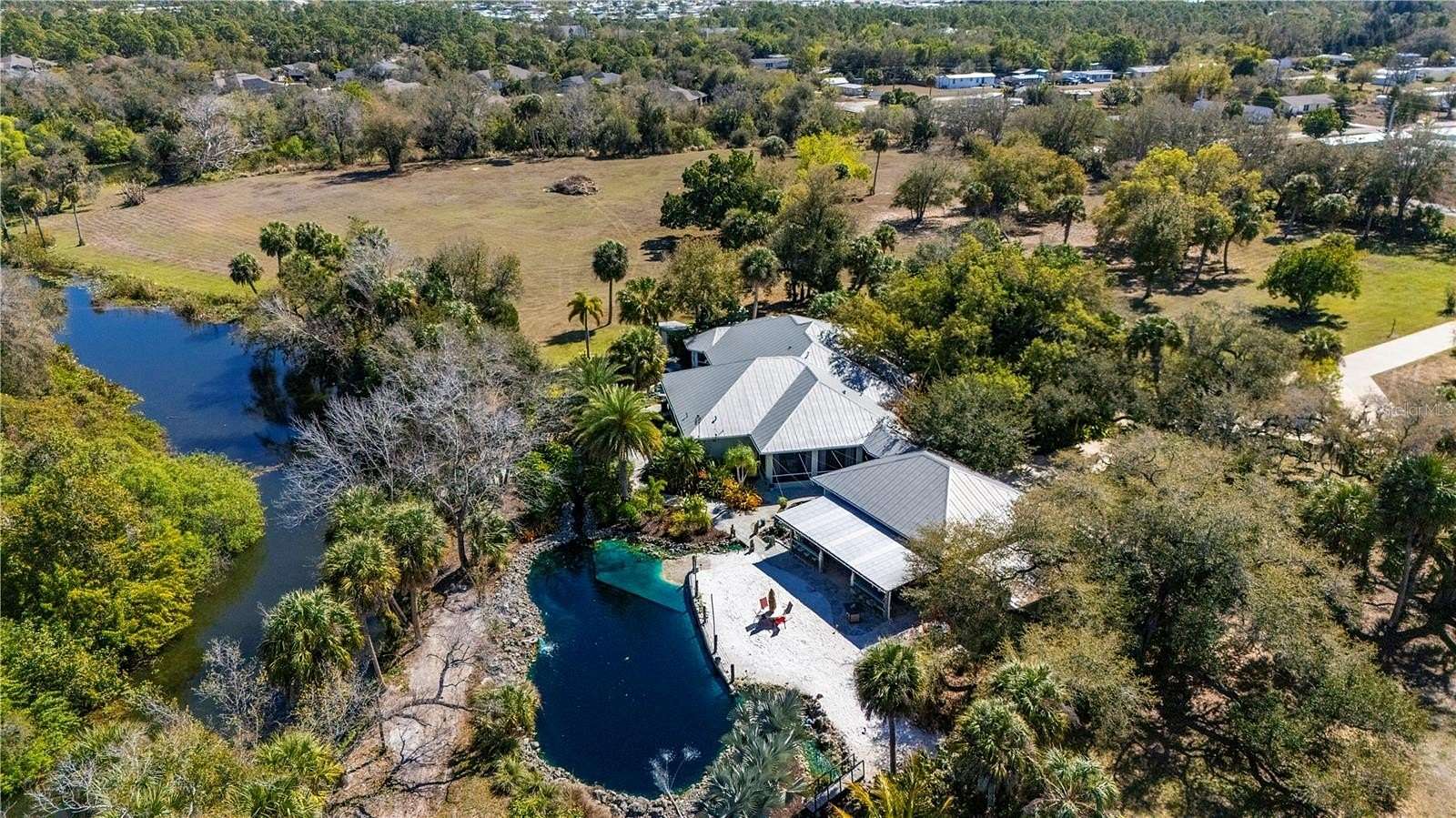 3.7 Acres of Land with Home for Sale in Punta Gorda, Florida