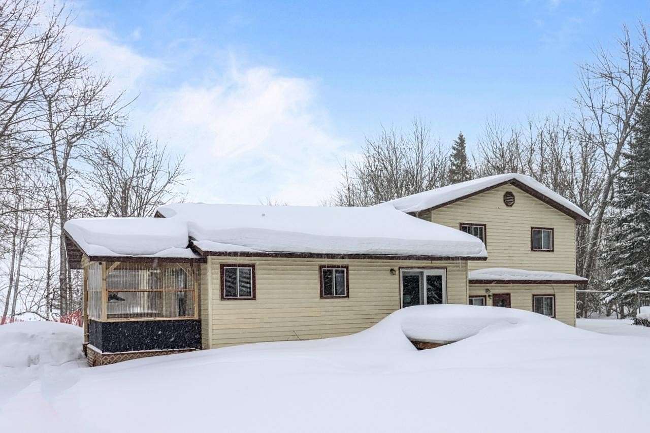 5.17 Acres of Land with Home for Sale in Bergland, Michigan